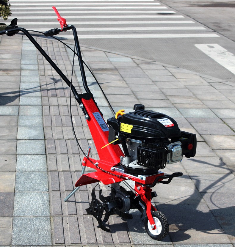 廠家直銷四沖程汽油微耕機小型家用大棚果園松土除草機農(nóng)用打田機