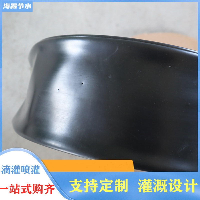 微噴帶廠家1寸32輸水帶霧化水帶黑色PE材質(zhì) 農(nóng)田果園澆地用微噴帶